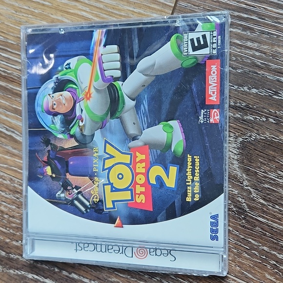 NWT Toy Story 2 Sega Dreamcast Video Game Woody Buzz Lightyear - Picture 1 of 6